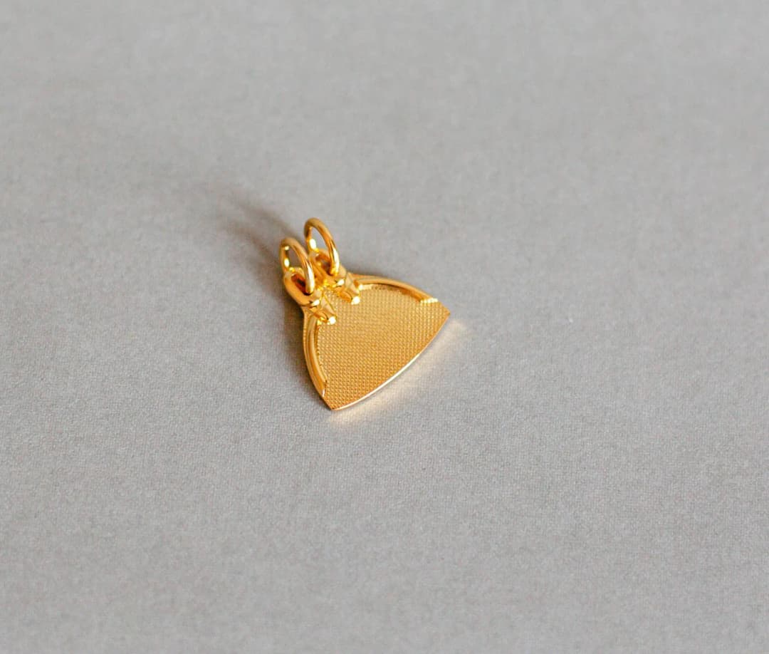 Gilded monofin pendant image